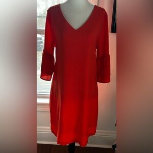 09- Orange V-Neck Women's dress size medium with bell sleeves